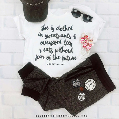 She is Clothed in Sweatpants | Women’s T-Shirt | Ruby’s Rubbish® - Ruby's Rubbish Wholesale